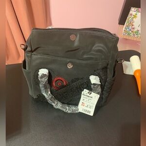 NWT. Black Disignal purse
